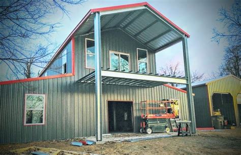 metal building with porch arond house|metal construction homes for sale.